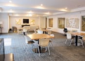 Thumbnail 11 of 16 - Resident Lounge with Sitting Area & TV at Kimpton Square Senior Apartments