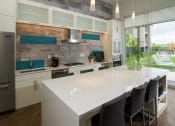 Thumbnail 33 of 40 - Kitchen Area In Clubhouse at Lofts at 7800 Apartments, Midvale, 84047