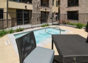 Thumbnail 7 of 25 - Sun Deck and Hot Tub  at Tuscany Villas Senior Apartments, Midvale, UT
