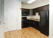 Thumbnail 4 of 25 - Corner Kitchen at Tuscany Villas Senior Apartments, Midvale