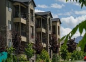 Thumbnail 6 of 25 - Classic architecture and stone work at Tuscany Villas Senior Apartments, Midvale, UT, 84047
