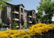 Thumbnail 12 of 25 - Flowers in bloom at Tuscany Villas Senior Apartments, Utah, 84047