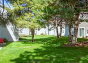 Thumbnail 20 of 26 - Green Spaces With Mature Trees at Devonshire Court Apartments & Townhomes, Utah