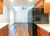Thumbnail 11 of 26 - Modern Kitchen With Custom Cabinet at Devonshire Court Apartments & Townhomes, Utah