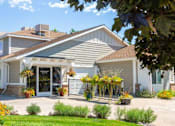 Thumbnail 22 of 26 - Elegant Exterior View at Devonshire Court Apartments & Townhomes, North Logan, UT, 84341