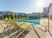 Thumbnail 32 of 38 - Relaxing Swimming Pool With Sundeck at Parc on Center Apartments & Townhomes, Utah, 84057