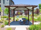 Thumbnail 28 of 38 - Covered Picnic Area at Parc on Center Apartments & Townhomes, Orem, UT