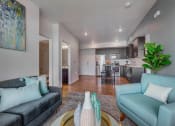 Thumbnail 6 of 36 - Warm And Inviting Living Room with Kitchen view at Element 31 Apartments, Salt Lake City, UT, 84106