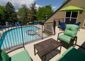 Thumbnail 15 of 26 - Shaded Lounge Area By Pool at Promontory Point Apartments, Utah