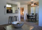 Thumbnail 7 of 26 - Warm Living And Dining Room at Promontory Point Apartments, Sandy, 84094