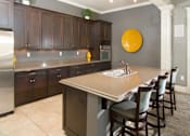 Thumbnail 27 of 38 - Gourmet Kitchen With Island at Resident Clubhouse San Marino Apartments, South Jordan, UT, 84095
