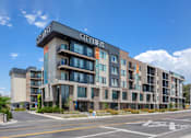 Thumbnail 1 of 42 - View of City Lofts Apartments from Street