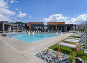 Thumbnail 13 of 40 - View of Clubhouse from Pool at Amara