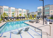Thumbnail 2 of 39 - View of Homes from Pool at The Austin Townhomes