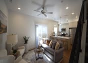 Thumbnail 3 of 27 - View of the Living Room and Kitchen at Desert Sage Townhomes