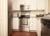 Thumbnail 2 of 10 - Burnett Station Kitchen with Stainless Steel Appliances