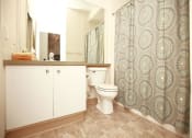 Thumbnail 5 of 10 - Main Bathroom with Tub at Burnett Station  Apartments Renton, Washington