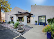 Thumbnail 4 of 46 - A building with a sign that says "LEASING OFFICE" on it.