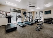 Thumbnail 17 of 27 - Workout Room with Gym Equipment at Providence Place Apartments, Salt Lake City, 84111