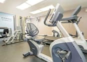 Thumbnail 17 of 20 - Workout Room  at River Oaks Apartments & Townhomes, Hanford, California