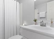 Thumbnail 9 of 12 - Bathroom with Mirror at Walker Mill Apartments, District Heights, MD