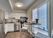 Thumbnail 4 of 14 - Chef-Inspired Kitchens Feature Stainless Steel Appliances at River Pointe Apartments, Fort Washington, 20744