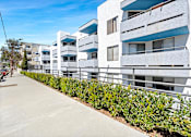 Thumbnail 33 of 38 - walkway in front of Harbor Terrace Apartments in San Pedro, CA