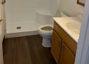 Thumbnail 7 of 7 - a small bathroom with a toilet and a shower