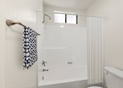 Thumbnail 29 of 38 - shower in bathroom of studio apartment at Harbor Terrace Apartments, California, 90731