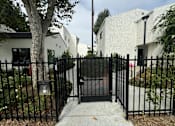 Thumbnail 21 of 44 - a gate entrance for the apartment buildings