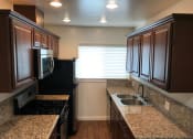 Thumbnail 4 of 8 - Woodruff Apartment Kitchen