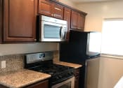 Thumbnail 6 of 8 - Woodruff Apartment Kitchen