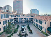 Thumbnail 8 of 30 - Lindbrook Manor Apartments Courtyard from a Drone
