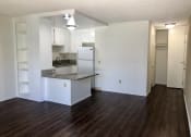 Thumbnail 12 of 22 - a kitchen and living room in an apartment