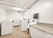 Thumbnail 14 of 16 - Laundry Room