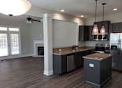Thumbnail 5 of 7 - Woodland Springs Townhomes | Entertaining Kitchens w/ Stainless Steel Appliances