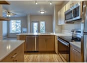 Thumbnail 2 of 29 - Kitchen with cabinets at Wilsonville Summit Apartments, Wilsonville , 97070