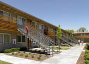 Thumbnail 6 of 11 - a group of people walking down a sidewalk in front of an apartment building