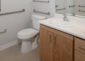 Thumbnail 17 of 17 - a bathroom with a sink toilet and a mirror