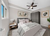 Thumbnail 23 of 48 - a bedroom with a large bed and a ceiling fan