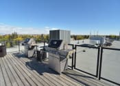 Thumbnail 7 of 12 - Inglewood 1410 Residential rental apartments rooftop patio BBQ stations