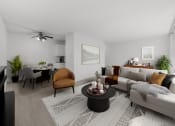 Thumbnail 11 of 33 - a living room with a couch and a table