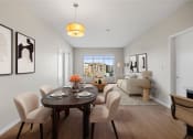 Thumbnail 2 of 72 - a living room and dining room with a table and chairs