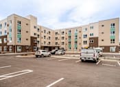 Thumbnail 14 of 35 - Parking Lot  at All Saints Apartments, DENVER