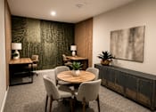 Thumbnail 16 of 28 - Modern business center with coworking desks, collaborative seating, private workstations, and contemporary finishes at 200 Main Kannapolis.