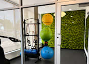 Thumbnail 5 of 28 - Dedicated yoga and wellness studio at 200 Main Kannapolis with fitness equipment, open workout space, and modern design.