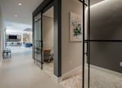 Thumbnail 11 of 66 - Quiet work nook with glass doors and modern lighting at The Rail at Bound Brook in Bound Brook, NJ.