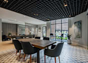 Thumbnail 46 of 66 - Bright dining and work nook in The Rail at Bound Brook resident lounge in Bound Brook, NJ.