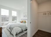 Thumbnail 26 of 66 - Pet-friendly luxury apartment bedroom in Downtown Bound Brook with oversized windows, abundant natural light, and spacious floorplan near NJ transit.