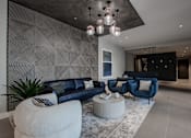 Thumbnail 2 of 33 - A modern lobby with a black and white striped wall in Bound Brook NJ.